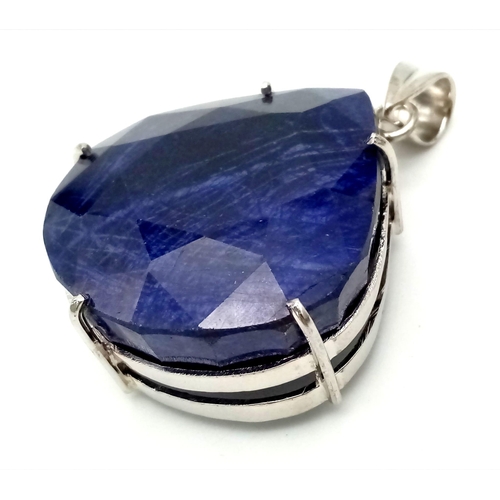 944 - A Large Natural 192ct Blue Sapphire Teardrop Pendant. Set In 925 Sterling Silver. 4.5 x 4cm. 94g tot... 