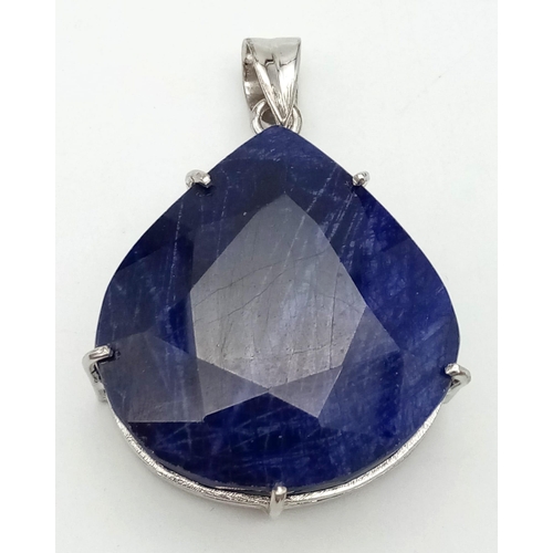 944 - A Large Natural 192ct Blue Sapphire Teardrop Pendant. Set In 925 Sterling Silver. 4.5 x 4cm. 94g tot... 