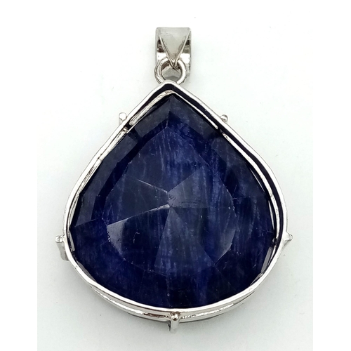 944 - A Large Natural 192ct Blue Sapphire Teardrop Pendant. Set In 925 Sterling Silver. 4.5 x 4cm. 94g tot... 