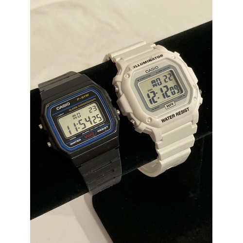 1020 - 2 x CASIO DIGITAL DIVERS WATCHES .A Casio illuminator in white, together with a black Casio F 91. Fu... 