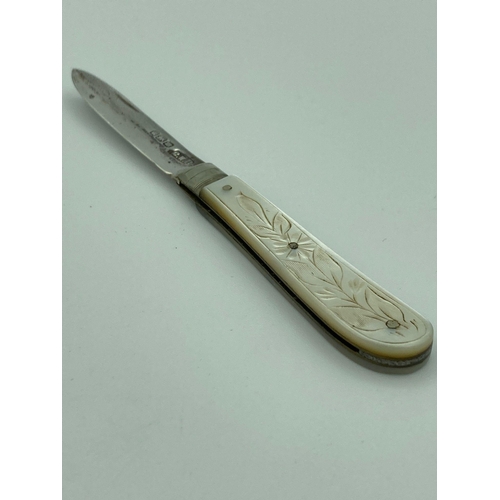 139 - Antique SILVER BLADED FRUIT KNIFE with nicely engraved mother of pearl handle and having clear hallm... 