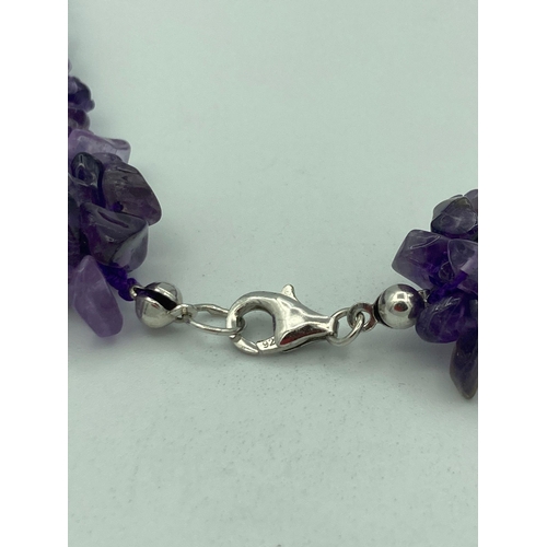 511 - Stunning SILVER and AMETHYST NECKLACE having three connected rows of rough cut and polished amethyst... 