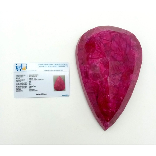 1079 - A Humongous 5540ct Pear Cut Natural Earth Mined Ruby. Colour Enhanced. 16 x 11cm.