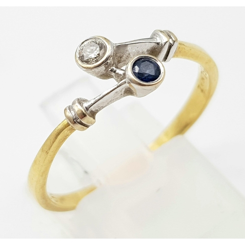 807 - 18K YELLOW GOLD DIAMOND AND SAPPHIRE 2 STONE TWIST RING.
WEIGHS 2.3G
SIZE T