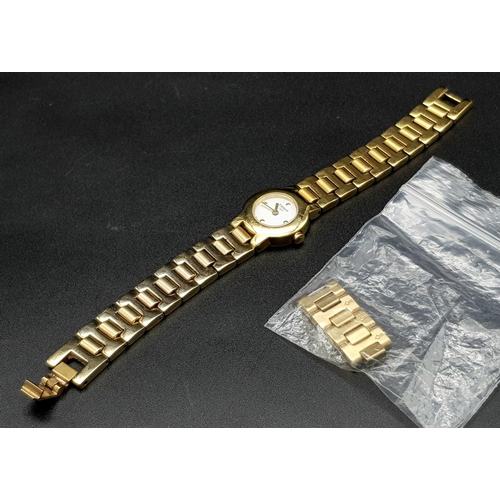 891 - A Tissot Gold Plated Ladies Quartz Watch. Gold plated strap and case - 20mm. White dial. Spare links... 