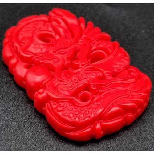 898 - A Red Dragon Figure Jade Pendant. 5cm.