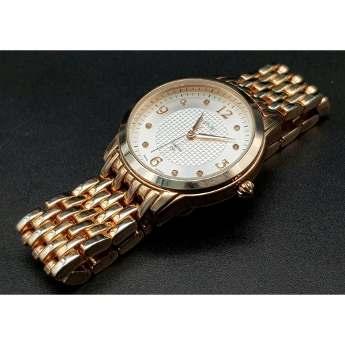 919 - An August Steiner Diamond Dial Gilded Ladies Watch. Case - 30cm. White dial. Quartz movement. In ver... 