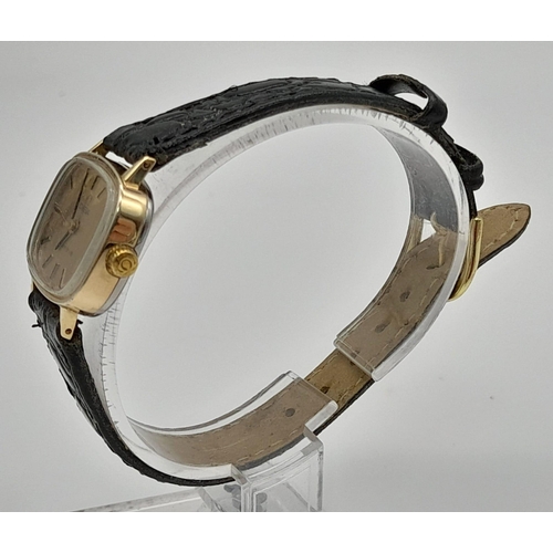 689 - A Vintage Omega Geneve Ladies Watch. Black leather strap. Case - 25mm. In working order. Mechanical ... 