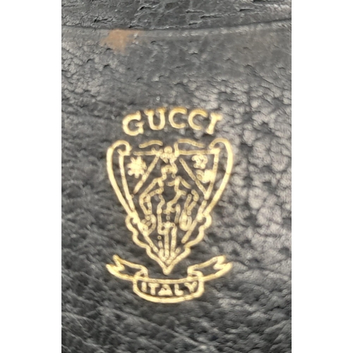 627 - A Gucci Monogram Canvas and Leather Wallet. 19 x 11cm. Ref: 10561