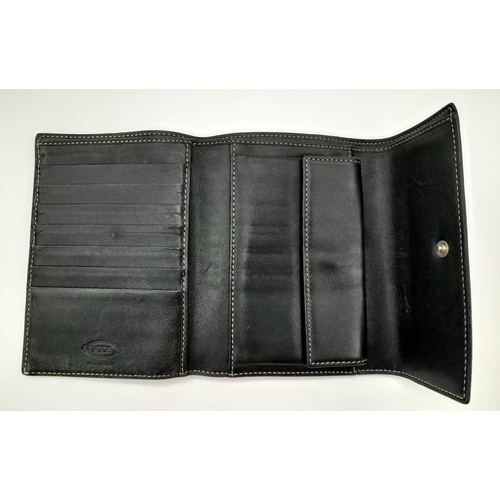 634 - A Black Leather Tod's Wallet. 14 x 11cm. Ref: 10562