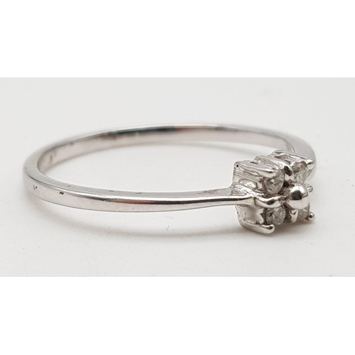 1075 - Platinum diamond ring. 1.2g, Size P.