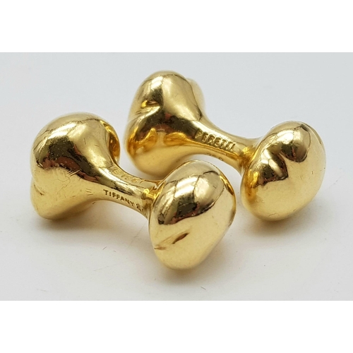 212 - An Elsa Peretti designed 18ct yellow gold cufflinks made by Tiffany and Co. These weigh 18.5 grams. ... 