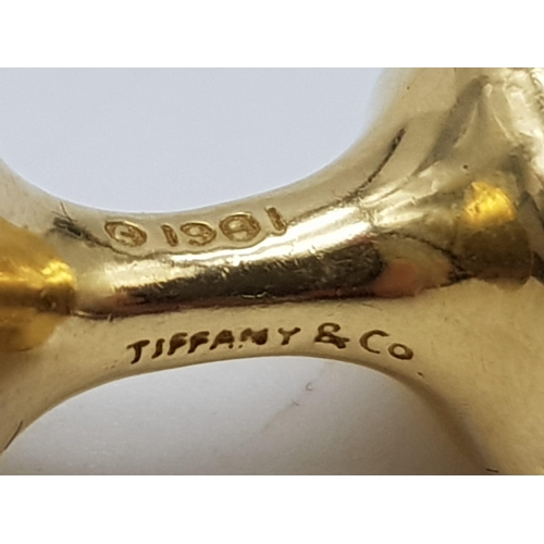 212 - An Elsa Peretti designed 18ct yellow gold cufflinks made by Tiffany and Co. These weigh 18.5 grams. ... 