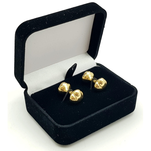 212 - An Elsa Peretti designed 18ct yellow gold cufflinks made by Tiffany and Co. These weigh 18.5 grams. ... 