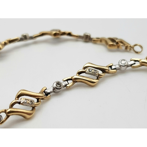 286 - 9k yellow gold diamond bracelet. 8.3g in weight.