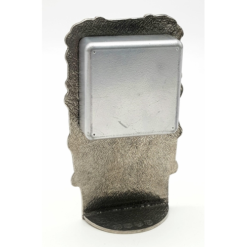 641 - A Pewter and Enamel Miniature Mantel Clock. 14x7cm. In Working Order.