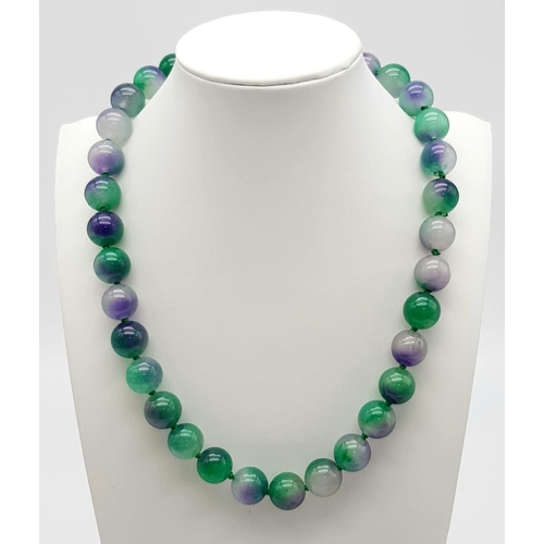 686 - A Purple-Green Jade Necklace and Matching Bracelet. 12mm beads. Expandable bracelet. Necklace - 42cm... 