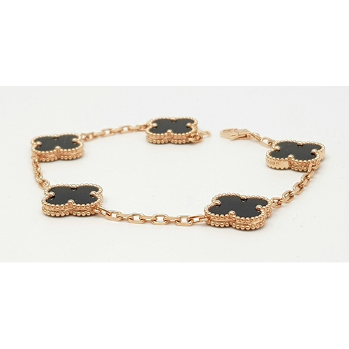 761 - A Van Cleef and Arpels Alhambra bracelet with 5 motifs - 18ct rose gold with black onyx inserts. Len... 