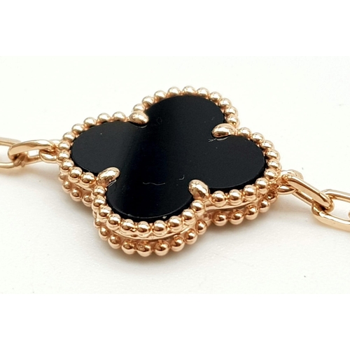 761 - A Van Cleef and Arpels Alhambra bracelet with 5 motifs - 18ct rose gold with black onyx inserts. Len... 