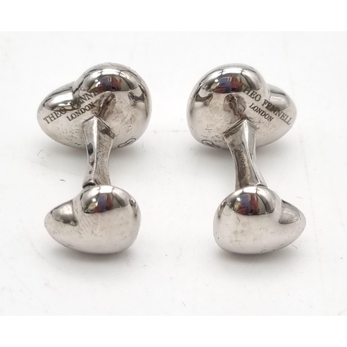 768 - A fabulous pair of Theo Fannell ‘art cufflinks made in18 carat white gold. These heart cufflinks are... 