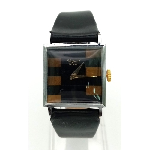 229 - A stainless steel CHOPARD ladies watch with leather strap. 25 x 25 mm case, black dial with tiger's ... 