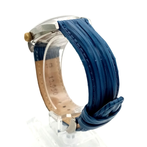 418 - A VINTAGE YEMA WATCH WITH AUTOMATIC MOVEMENT AND STRIKING BLUE LEATHER STRAP.36mm