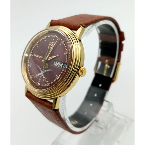 432 - A RARE CANDID 3000S MANUAL WIND WRIST WATCH WITH RED DIAL AND LEATHER STRAP. 32mm