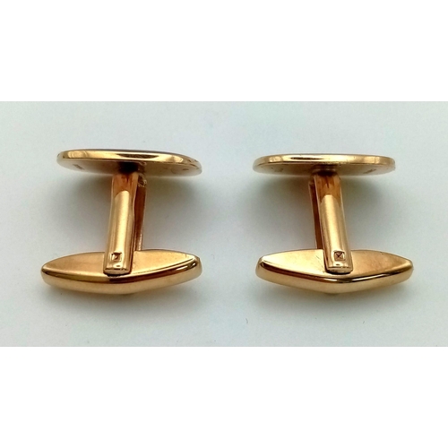 826 - A PAIR OF 9K GOLD AND ENAMEL MASONIC CUFF LINKS.10.6gms