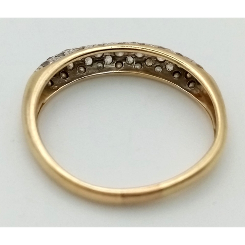 878 - 9k yellow gold diamond band ring. 0.30ct, 1.8g, size M.