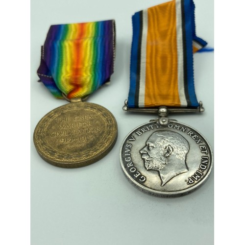 434 - Pair of World War I Medals awarded to 54265 PRIVATE E. GADSDEN of the KINGS ROYAL RIFLE CORPS, compl... 