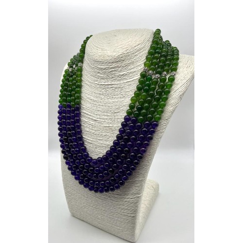 143 - A 1000ct Jade and Amethyst Five-Strand Statement Necklace. 8mm beads. 44-52cm.