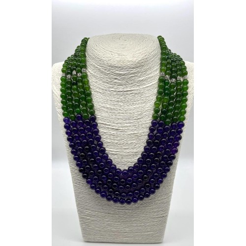 143 - A 1000ct Jade and Amethyst Five-Strand Statement Necklace. 8mm beads. 44-52cm.