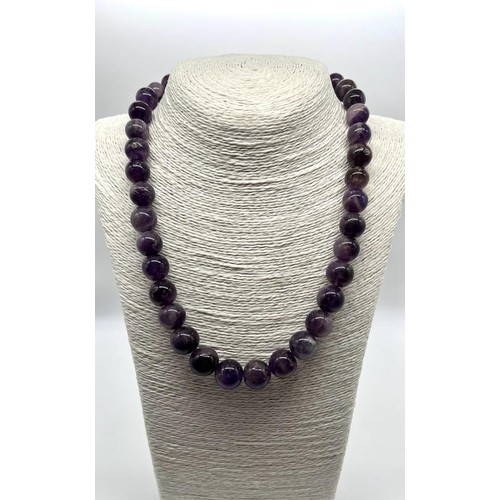 643 - A Deep Shades of Purple Amethyst Graduated Bead Necklace. 10-15mm.