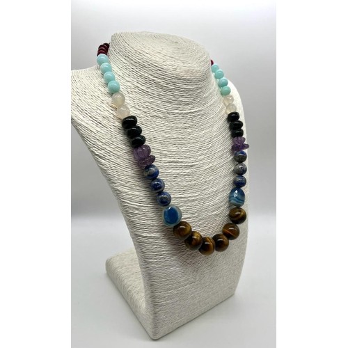 203 - A Colourful Jade, Lapis Lazuli, Tigers Eye, Amethyst and Onyx Graduated Bead necklace. 8-16mm beads.... 