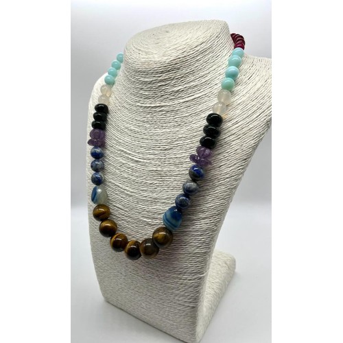 203 - A Colourful Jade, Lapis Lazuli, Tigers Eye, Amethyst and Onyx Graduated Bead necklace. 8-16mm beads.... 