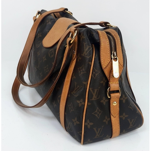 108 - A Louis Vuitton Monogram Canvas Stresa PM Bag. Leather trim with gold-tone hardware. Nylon lined spa... 