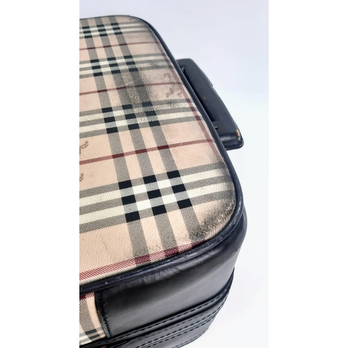 208 - A BURBERRY CARRY ON SUITCASE