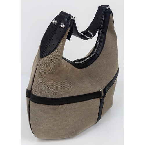 266 - A Gucci Reins Web Hobo Canvas Bag. Beige canvas and brown leather in a cross shape. Silver-tone hard... 