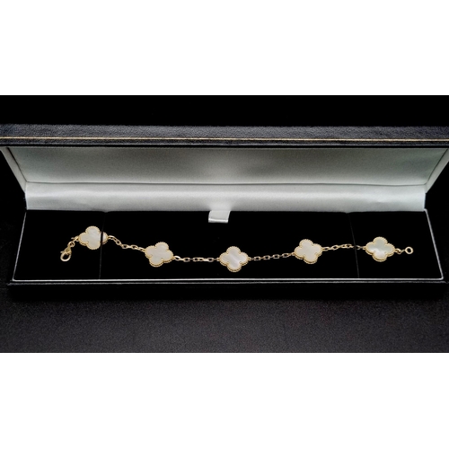 307 - A Van Cleef and Arpels Alhambra bracelet with 5 motifs - 18ct yellow gold with Mother of pearl inser... 