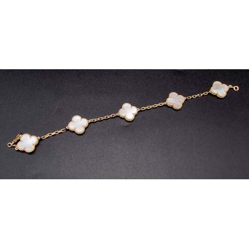 307 - A Van Cleef and Arpels Alhambra bracelet with 5 motifs - 18ct yellow gold with Mother of pearl inser... 