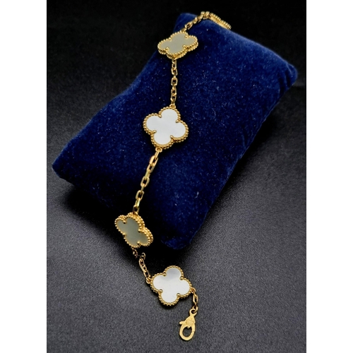 307 - A Van Cleef and Arpels Alhambra bracelet with 5 motifs - 18ct yellow gold with Mother of pearl inser... 