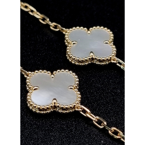 342 - A Van Cleef and Arpels Alhambra chain with 10 motifs - 18ct yellow gold with mother of pearl motif i... 