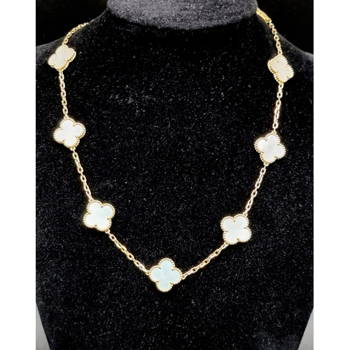 342 - A Van Cleef and Arpels Alhambra chain with 10 motifs - 18ct yellow gold with mother of pearl motif i... 