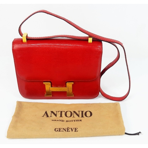 38 - A Vintage Hermes Constance Handbag. Burgundy red crocodile leather. Gilded hardware with letter H cl... 