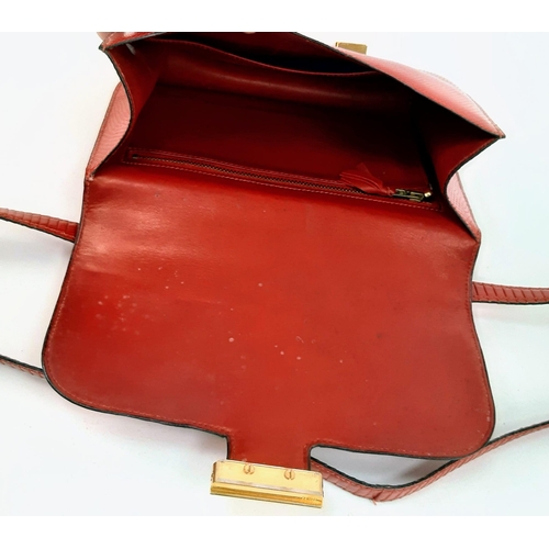 38 - A Vintage Hermes Constance Handbag. Burgundy red crocodile leather. Gilded hardware with letter H cl... 