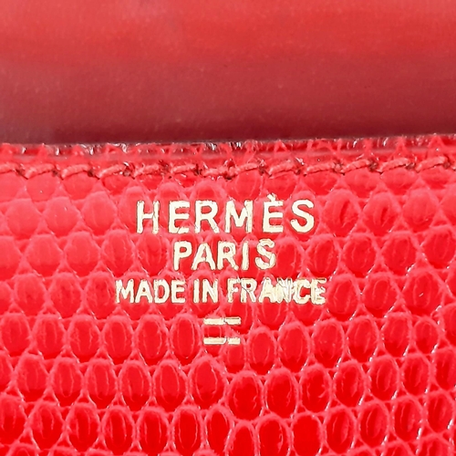 38 - A Vintage Hermes Constance Handbag. Burgundy red crocodile leather. Gilded hardware with letter H cl... 