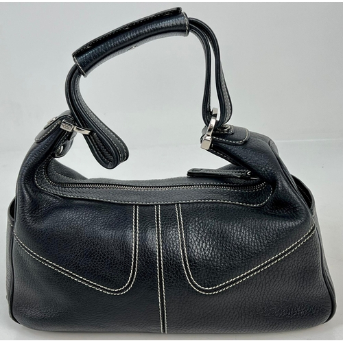 599 - A Tod'S Black Leather Handbag with Double Exterior Zipped Compartments. 26 x 15cm. In good condition... 