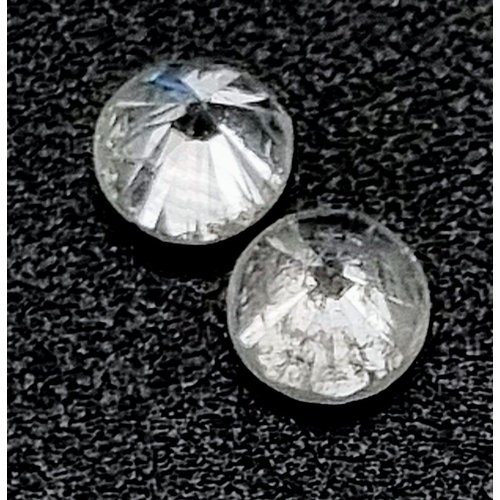 616 - Pair of round brilliant diamonds, 0.44 carats in total.