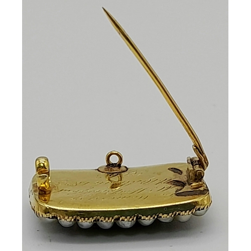 173 - A King William IV (1830s) High Karat Gold Emerald, Seed Pearl and Jet Memorial Brooch. 22mm. 4.11g t... 