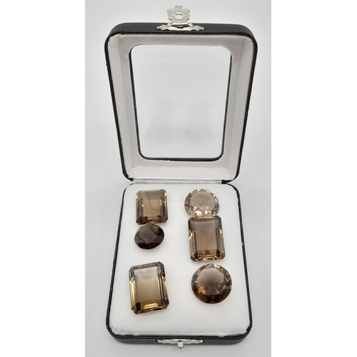 572 - Assorted Collection of Approx. 100ct of Smokey and Lemon Quartz, Comes in a Presentation Case